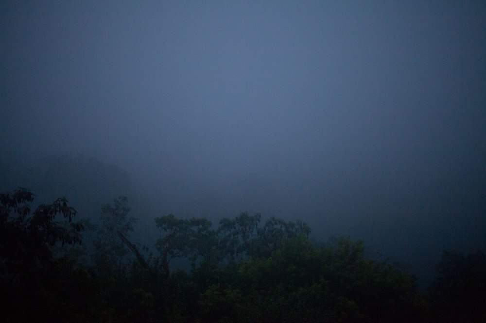 The border crossing from Belize to Guatemala took about two hours because we sought shelter in the Aduana office from a rainstorm but it should have taken only 45 minutes. We immediate left for Tikal National Park from the border and arrived to our hotel at 5:30pm. Should you ever got to Tikal we recommend the 4am hike to Temple 4. As the darkness starts to lift your view from the top of the pyramid goes from pitch black to grey (seen here) and just the tops of the trees are visible as the howler monkeys and birds start their morning. Sitting on the top of a 1,271 year old pyramid hearing the forest come alive was one of my favorite travel experiences to date - made more poignant by my realization that the sounds we were enjoying have existed far longer. Photo: Alex Washburn