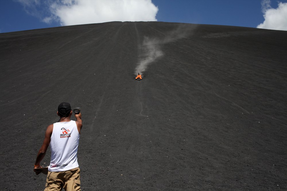 Our secondary guide waits at the bottom of Cerro Negro with a speed gun. Photo: Alex Washburn