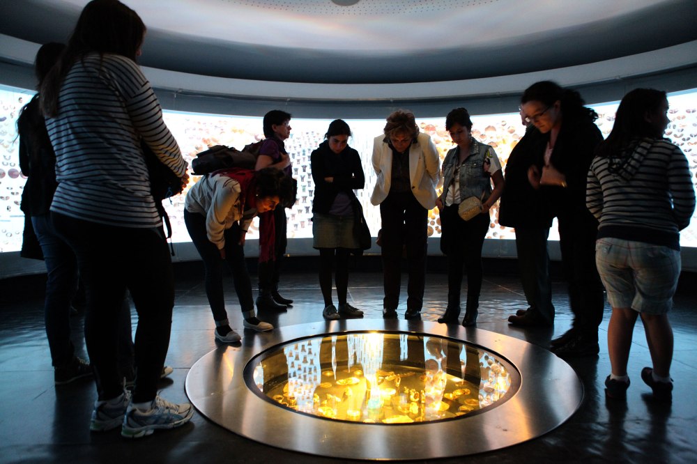 A group of tourists checks out a display at the Museo de Oro (Gold Museum) in downtown Bogota. Photo: Alex Washburn