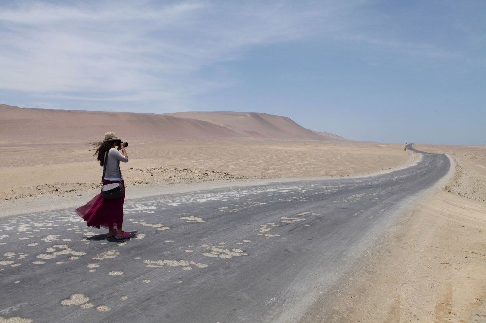 One of our fellow tourists (from Hong Kong) at Reserva Nacional de Paracas. Photo: Alex Washburn